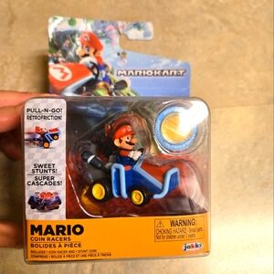 New in box Mario coin racers